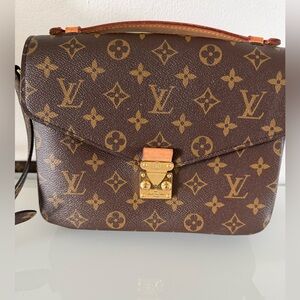 Authentic Louis Vuitton monogram pochette Métis